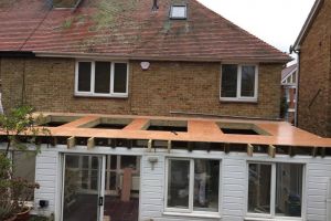 Over boarding Roof Prior to warm roof installation